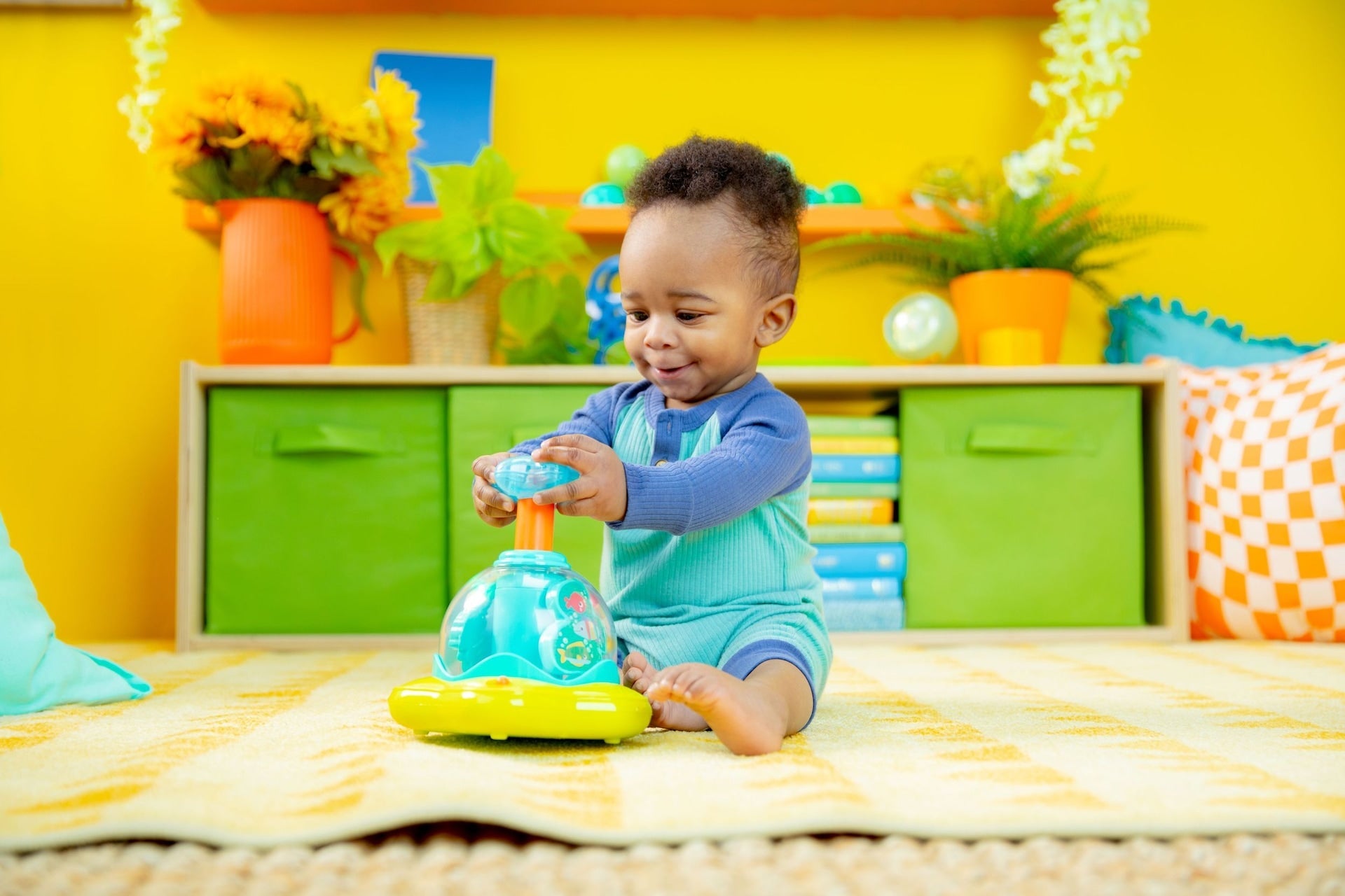 Bright Starts Drücken und Glüh Spinner Spielzeug